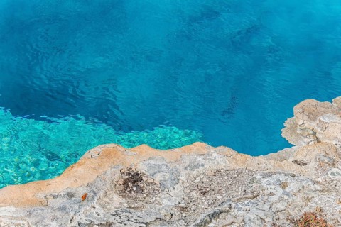 Turquoise clear water of a hot spring