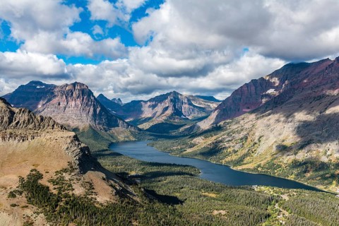 View from Continental Divide Trail onto Mountain Lake Two Medicine Lake with mountain landscape