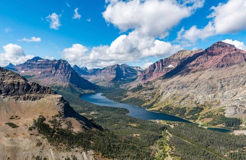 View from Continental Divide Trail onto Mountain Lake Two Medicine Lake with mountain landscape