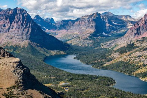 View from Continental Divide Trail onto Mountain Lake Two Medicine Lake with mountain landscape