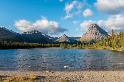 Mountain lake Two Medicine Lake in mountain landscape
