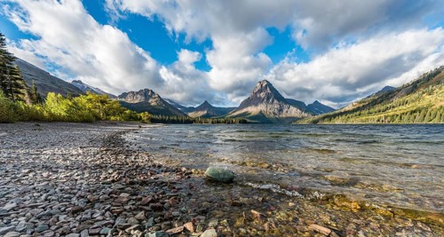 Mountain lake Two Medicine Lake in mountain landscape