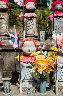 Jizo statues with red caps