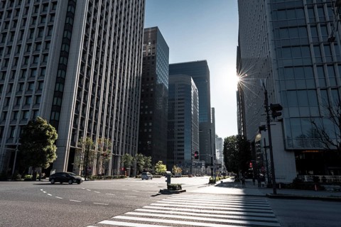 Traffic street in the city center with skyscrapers