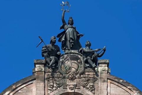 Ornametal gable from the Opera House with coat of arms of Nuremberg and sculptures