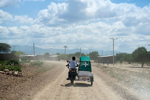 Emergency doctor on motorcycle with sidecar