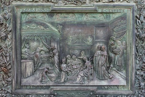 Bronze relief at the entrance portal