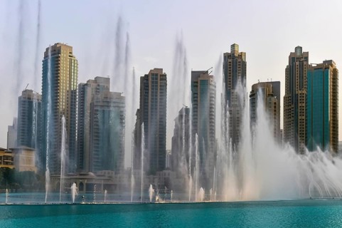 Fountains in front of skyscrapers