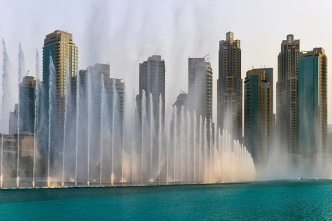 Fountains in front of skyscrapers