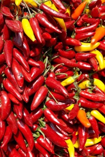 Strings of chillis being dried