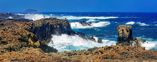 Coast with basalt cliffs