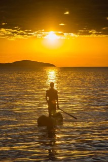 Fisherman in his canoe on Lake Malawi