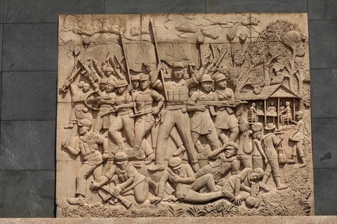 War scene on a memorial plaque at the Memorial Monument