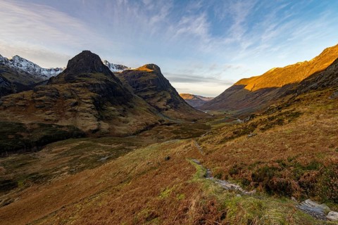 Hiking trail in mountain scenery with peaks of Stob Coire nan Lochan