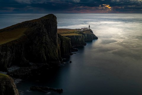 West coast Isle of Sky with North Sea with lighthouse at blue hour
