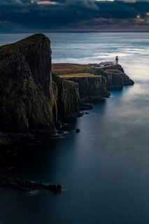West coast Isle of Sky with North Sea with lighthouse at blue hour