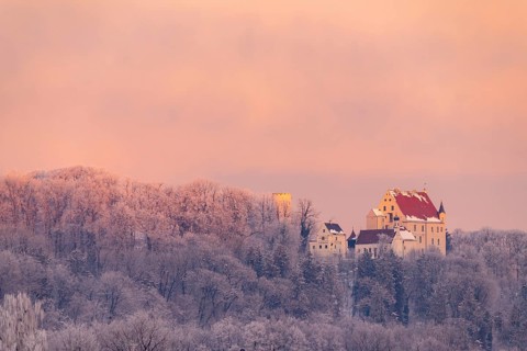 Mindelburg Castle in winter forest at sunrise