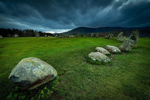 Stone circle with dramatic cloud sky