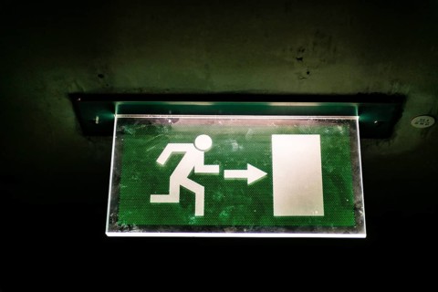 Illuminated emergency exit sign