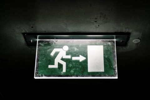Illuminated emergency exit sign