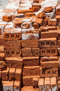 Stacked red bricks