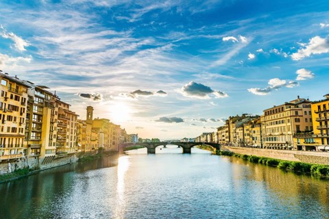 View of Ponte Santa Trinita bridge from Ponte Vecchio over Arno River