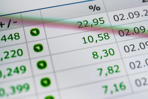 Close up of rising stock prices on smartphone screen