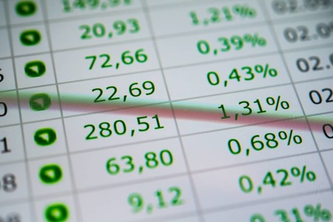Close up of rising stock prices on smartphone screen