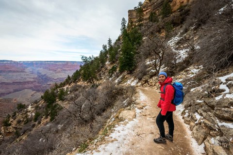 Young woman descending into the Grand Canyon