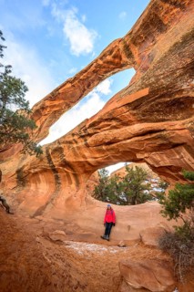 Hiker at Double O Arch