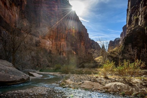 Sun shines over rock face