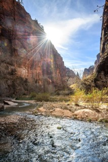 Sun shines over rock face