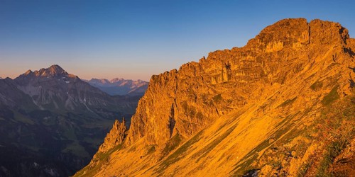View from Krumbach highroute under morning sun to Biberkopf