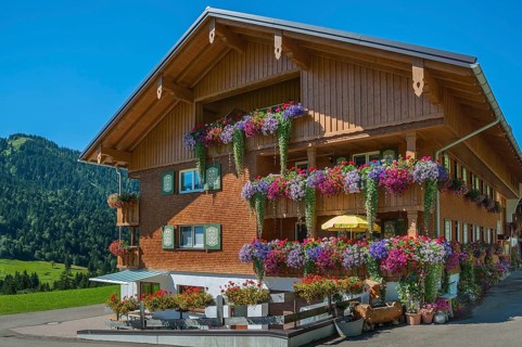 Outside of home with wooden shingle facade