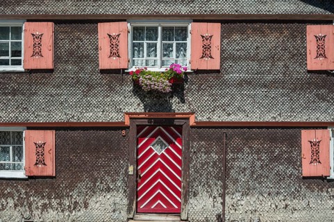 Facade with weathered wood shingles