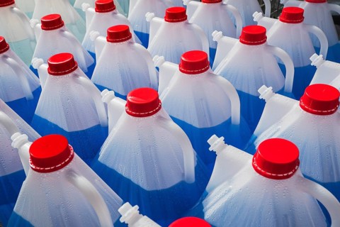 Plastic bottles with liquid for windscreen washer systems in DIY stores