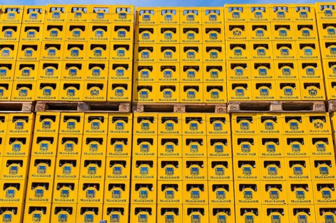 Stack with beer crates of the Schlossbrauerei Maxlrain near Tuntenhausen