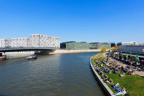 Ludwig Erhard Ufer at the river Spree with deckchairs
