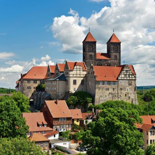 Schlossberg with abbey church of St. Servatius and castle above historic centre