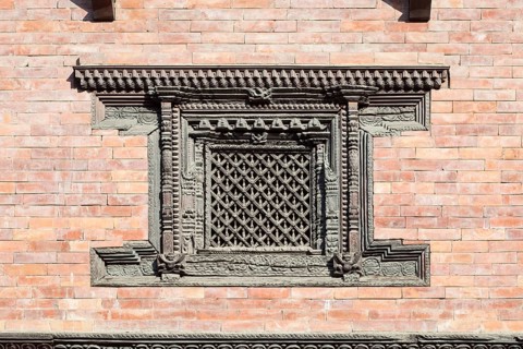 Beautifully carved wooden window at the royal palace Patan Durbar square