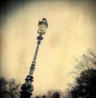 Lamppost in wrought iron and old fashioned