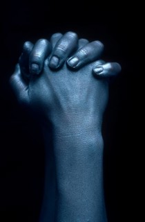 Close-up of crossed hands