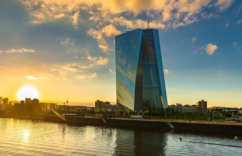European Central Bank at sunset with skyline