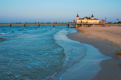 Beach with Ahlbeck pier in evening light