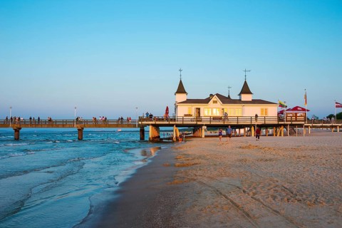 Beach with Ahlbeck pier in evening light