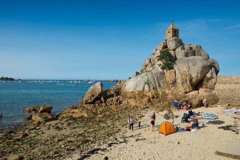Beach and chapel on rocks, Port Blanc