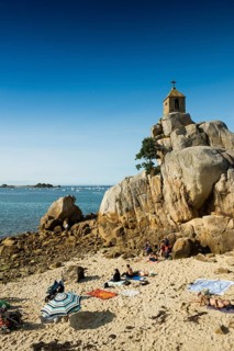 Beach and chapel on rocks, Port Blanc
