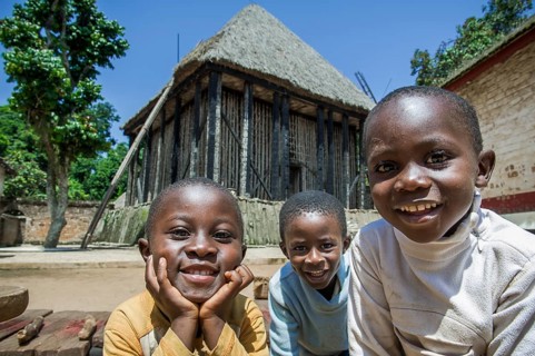 Happy children in front of meeting room