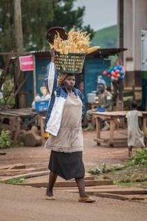 Corn seller on way to market