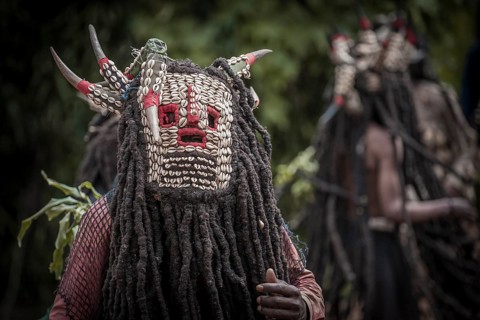 Men of the ethnic group of the Bamileke with traditional masks